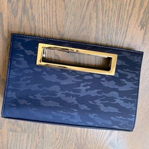 NWOT. Call It Spring Beautiful Navy and Gold Clutch.